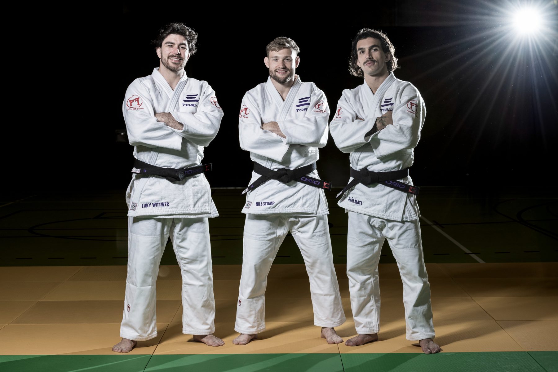 Lukas Wittwer, Nils Stump und Naïm Matt auf der Matte